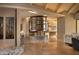 Elegant entryway showcasing a striking metal and wood art installation at 11271 E Cinder Cone Trl, Scottsdale, AZ 85262