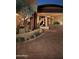 Modern entry with a unique door and beautiful landscaping at 11271 E Cinder Cone Trl, Scottsdale, AZ 85262
