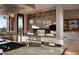 Spacious kitchen with expansive windows and high-end finishes at 11271 E Cinder Cone Trl, Scottsdale, AZ 85262