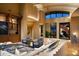 Spacious living room with high ceilings and stylish furnishings at 11271 E Cinder Cone Trl, Scottsdale, AZ 85262
