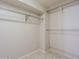 Spacious walk-in closet with wire shelving at 12436 N 105Th Ave, Sun City, AZ 85351