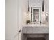 Modern powder room with floating vanity and marble countertop at 14517 E Buckboard Ct, Fountain Hills, AZ 85268