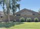 Back of house with stucco siding and a block wall at 16926 W Sonora St, Goodyear, AZ 85338