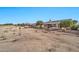 Landscaped backyard with partial view of golf course at 17620 N Stone Haven Dr, Surprise, AZ 85374