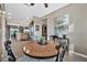 Cozy breakfast nook with a round table and chairs, kitchen view at 17620 N Stone Haven Dr, Surprise, AZ 85374