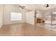 Bright living room with tile floors and kitchen access at 20806 N 30Th Dr, Phoenix, AZ 85027