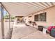 Covered patio, gravel yard, and mature plants at 2110 W Silvergate Dr, Chandler, AZ 85224