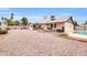 Spacious backyard with gravel and a view of the house at 2110 W Silvergate Dr, Chandler, AZ 85224