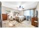 Bedroom with double bed, dresser, and ceiling fan at 2110 W Silvergate Dr, Chandler, AZ 85224