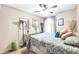 Bedroom with double bed, ceiling fan, and dresser at 2110 W Silvergate Dr, Chandler, AZ 85224