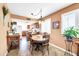 Cozy dining area with a round wooden table and kitchen view at 2110 W Silvergate Dr, Chandler, AZ 85224