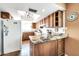 Spacious kitchen with granite countertops and wooden cabinets at 2110 W Silvergate Dr, Chandler, AZ 85224