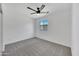 Simple bedroom with grey carpet and a window at 225 N Standage -- # 40, Mesa, AZ 85201