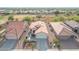 Aerial view of single story home and neighborhood at 22993 W Lasso Ln, Buckeye, AZ 85326