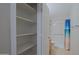 Bathroom with shower, grab bars, and linen closet at 4047 E Rowel Rd, Phoenix, AZ 85050