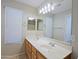 Double vanity bathroom with updated fixtures and ample storage at 4047 E Rowel Rd, Phoenix, AZ 85050