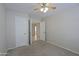 Bedroom with two closets and access to another room at 4047 E Rowel Rd, Phoenix, AZ 85050