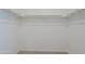 Walk-in closet with double hanging rods at 4047 E Rowel Rd, Phoenix, AZ 85050