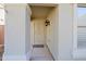 Welcoming entryway with a decorative screen door at 4047 E Rowel Rd, Phoenix, AZ 85050