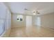 Spacious living room featuring tile floors and ceiling fan at 4047 E Rowel Rd, Phoenix, AZ 85050
