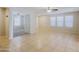 Spacious living room with tile floors and neutral colors at 4047 E Rowel Rd, Phoenix, AZ 85050