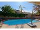 Refreshing kidney-shaped pool and spacious patio at 4047 E Rowel Rd, Phoenix, AZ 85050
