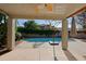 Inviting backyard pool with patio and covered seating at 4047 E Rowel Rd, Phoenix, AZ 85050