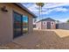 Backyard with patio, shed, and gravel landscaping at 4620 W Dahlia Dr, Glendale, AZ 85304