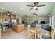 Modern kitchen with granite countertops and adjacent dining area at 496 Leisure World --, Mesa, AZ 85206