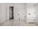 Laundry room with tile floors and built-in shelving at 533 W 18Th St, Tempe, AZ 85281