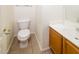 Small half bathroom with single sink and toilet at 533 W Prickly Pear Dr, Casa Grande, AZ 85122