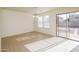 Bright dining area with tile floors and sliding glass doors at 533 W Prickly Pear Dr, Casa Grande, AZ 85122