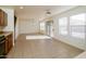 Kitchen with tile flooring, wood cabinets, and a breakfast nook at 533 W Prickly Pear Dr, Casa Grande, AZ 85122