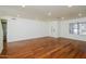 Open living room, hardwood floors, recessed lighting, and half bathroom at 533 W Prickly Pear Dr, Casa Grande, AZ 85122