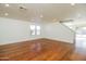 Spacious living area with hardwood floors and recessed lighting at 533 W Prickly Pear Dr, Casa Grande, AZ 85122