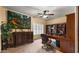 Bright home office features built-in shelving and a large desk at 5640 E Miramonte Dr, Cave Creek, AZ 85331