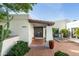 Spanish style home with courtyard entry and mature landscaping at 6836 N 1St Pl, Phoenix, AZ 85012