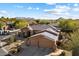 Single-story home with solar panels and mountain views at 7979 E Evening Glow Dr, Scottsdale, AZ 85266