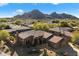 Single-story home with mountain views in a community setting at 7979 E Evening Glow Dr, Scottsdale, AZ 85266