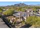 Home with solar panels, a patio, and mountain views at 7979 E Evening Glow Dr, Scottsdale, AZ 85266