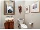 Modern powder room with an onyx sink and unique wooden vanity at 7979 E Evening Glow Dr, Scottsdale, AZ 85266
