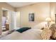 Charming bedroom with queen bed and en-suite bathroom at 7979 E Evening Glow Dr, Scottsdale, AZ 85266