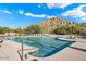 Relaxing community pool with ample lounge chairs at 7979 E Evening Glow Dr, Scottsdale, AZ 85266