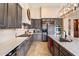 Modern kitchen with upgraded cabinetry, center island and high-end appliances at 7979 E Evening Glow Dr, Scottsdale, AZ 85266