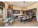 Bright kitchen with breakfast nook, island, and stainless steel appliances at 7979 E Evening Glow Dr, Scottsdale, AZ 85266