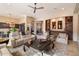 Relaxing living room featuring built-in shelving and a cozy fireplace at 7979 E Evening Glow Dr, Scottsdale, AZ 85266