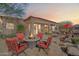 Outdoor patio with fire pit and seating area at 7979 E Evening Glow Dr, Scottsdale, AZ 85266