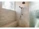 Spa-like shower with bench seat and glass enclosure at 7979 E Evening Glow Dr, Scottsdale, AZ 85266
