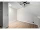 Spacious loft bedroom with wood floors and skylight at 8055 E Thomas Rd # D115, Scottsdale, AZ 85251