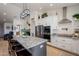 Spacious kitchen with granite countertops, stainless steel appliances, and an island at 1187 W Lucky Ln, San Tan Valley, AZ 85144